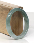 Baikalla Icy Oil-Green Jadeite Jade Oval Bangle (57.5mm)