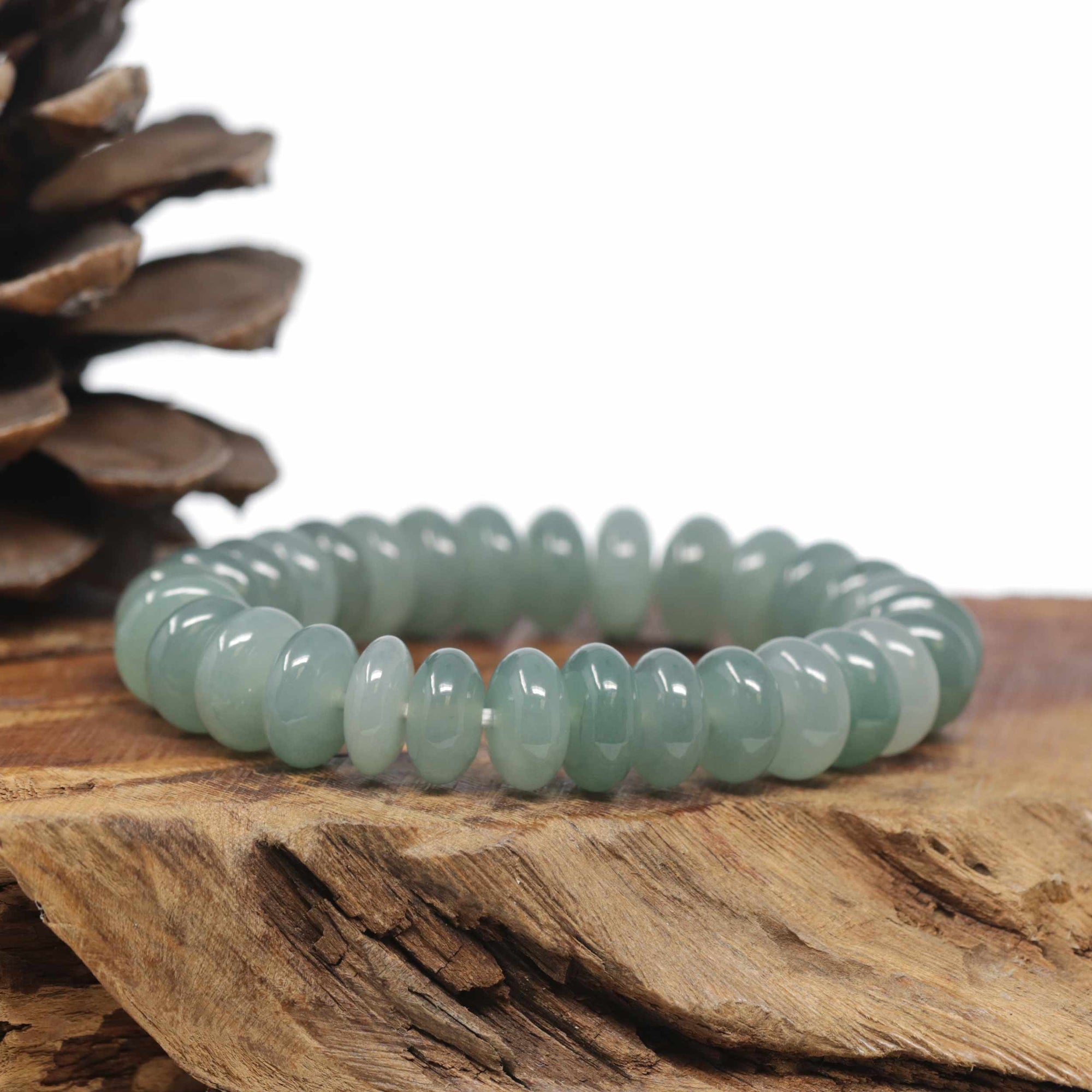 Baikalla Natural Icy Oil-Green Jadeite Jade Donut Shaped Bead Bracelet (12mm)