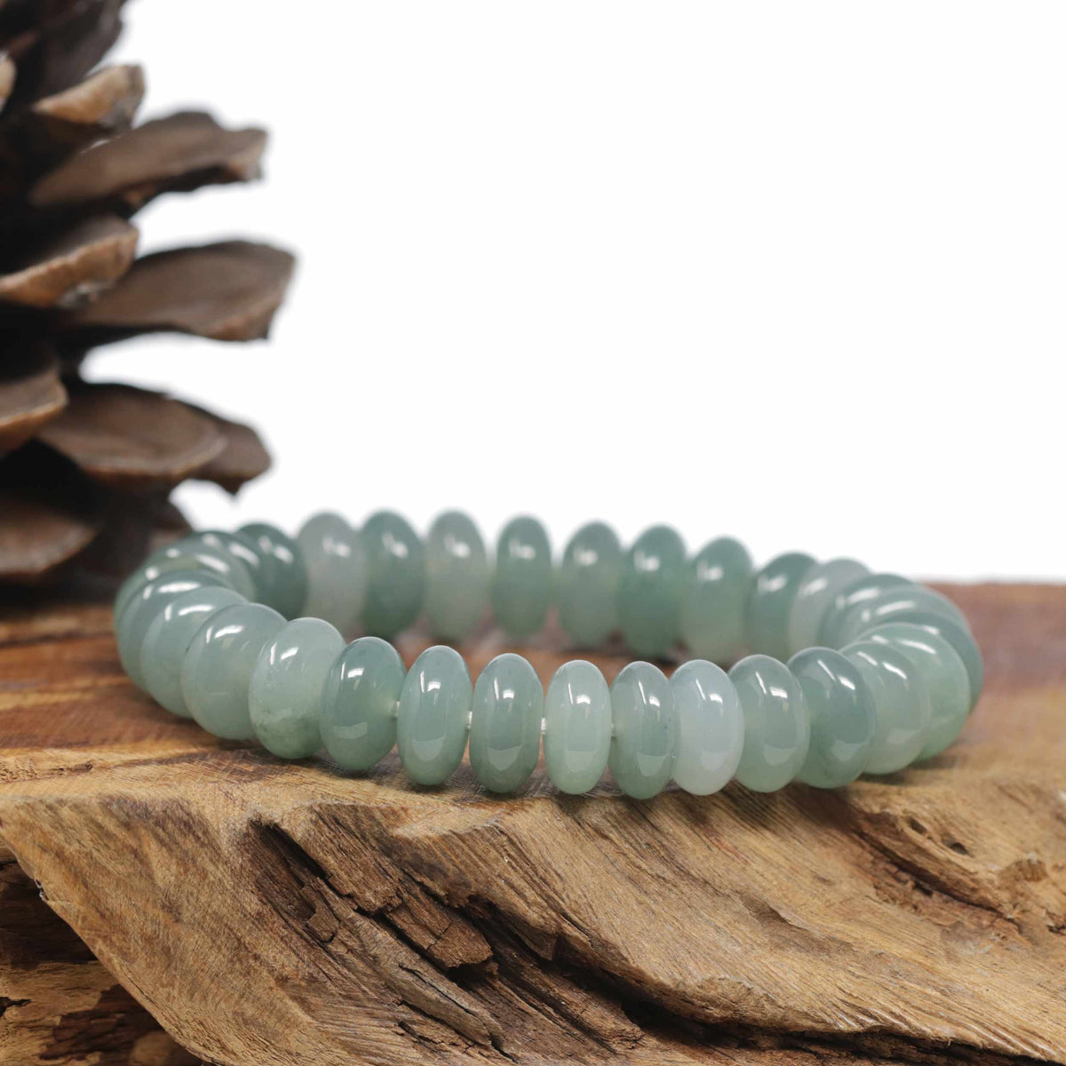 Baikalla Natural Icy Oil-Green Jadeite Jade Donut Shaped Bead Bracelet (12mm)