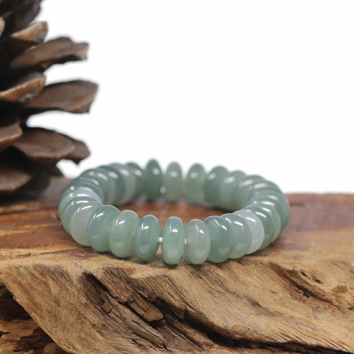 Baikalla Natural Icy Oil-Green Jadeite Jade Donut Shaped Bead Bracelet (12mm)