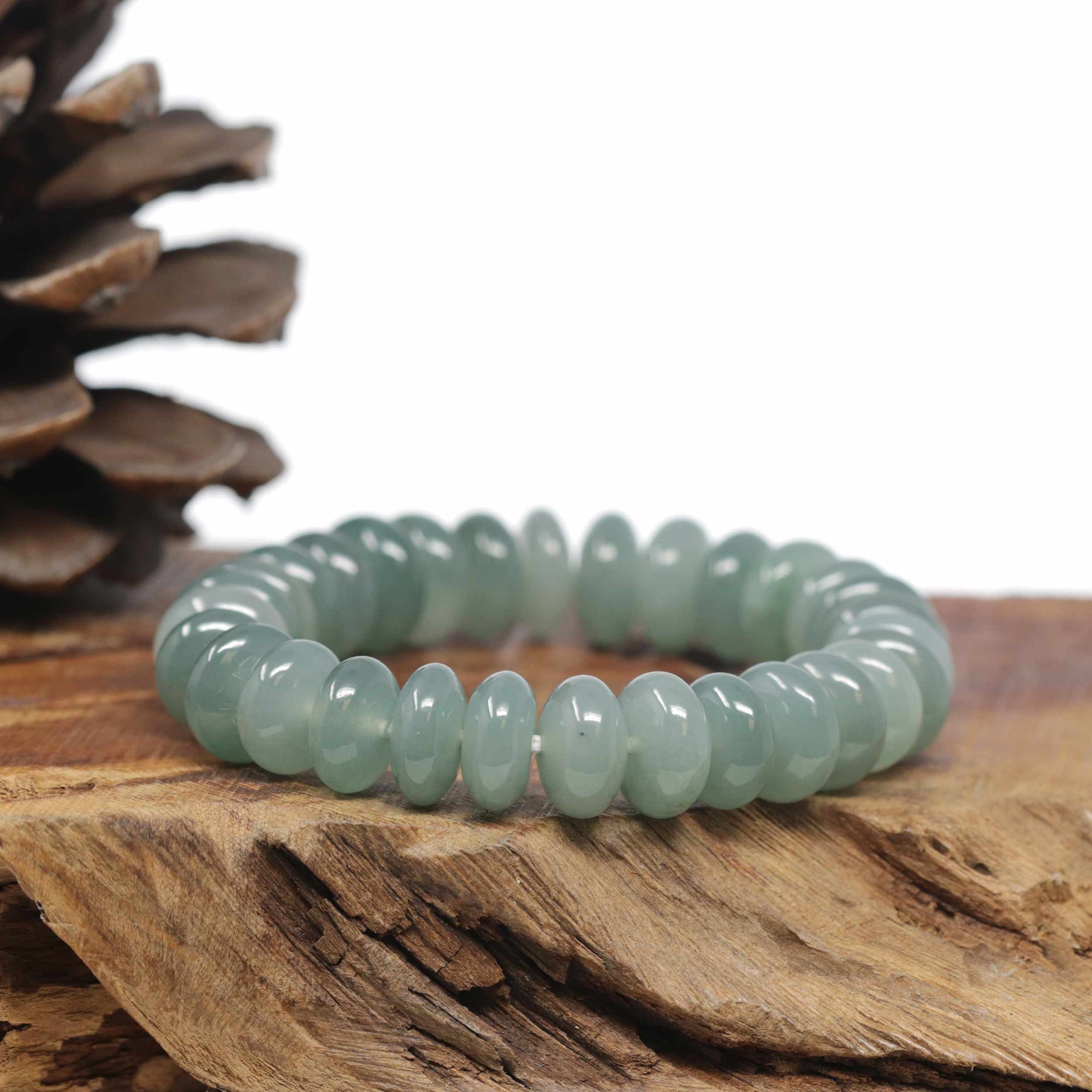 Baikalla Natural Icy Oil-Green Jadeite Jade Donut Shaped Bead Bracelet (12mm)