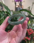 Baikalla Icy Deep Oil-Green Jadeite Jade Oval Bangle (52.1mm) 