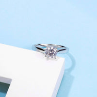 Baikalla Baikalla™ "Eniko" Sterling Silver Moissanite 4 Prong Solitaire Promise Ring